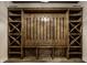 Elaborate wooden wine rack in finished basement at 4292 Alderborough Way, Zionsville, IN 46077