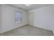 Bedroom with neutral colors, a window view to the outdoors, and a closet at 5288 Ivy Hill Dr, Carmel, IN 46033