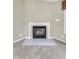 Cozy living room fireplace with a tile hearth and mantel at 5288 Ivy Hill Dr, Carmel, IN 46033