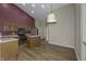 Open kitchen featuring wood cabinets, stainless appliances, and a spacious layout at 5288 Ivy Hill Dr, Carmel, IN 46033