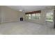 Large living room with fireplace, vaulted ceiling and ample natural light at 5288 Ivy Hill Dr, Carmel, IN 46033