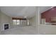 Open concept living room with fireplace, neutral color scheme, carpet, and natural light at 5288 Ivy Hill Dr, Carmel, IN 46033