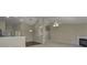 Open-concept living room featuring hardwood floors and a cozy fireplace at 5288 Ivy Hill Dr, Carmel, IN 46033