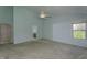 This is a spacious main bedroom with a ceiling fan and a window overlooking the grounds at 5288 Ivy Hill Dr, Carmel, IN 46033