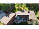 Overhead view showcasing the home's layout, including outdoor living space and distinctive architectural design at 5528 State Road 144, Greenwood, IN 46143