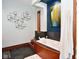 Modern bathroom featuring a soaking tub, slate tile, and unique wall décor for a spa-like experience at 5528 State Road 144, Greenwood, IN 46143