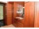 Custom walk-in closet with built-in drawers, shelving, and mirrored doors for organized storage at 5528 State Road 144, Greenwood, IN 46143