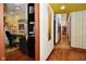 Open hallway with a view into the creative office space, featuring a decorative yellow ceiling at 5528 State Road 144, Greenwood, IN 46143