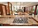 Gourmet kitchen featuring granite countertops, stainless steel appliances, and an expansive cooktop, perfect for culinary enthusiasts at 5528 State Road 144, Greenwood, IN 46143
