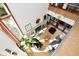 Bright and airy living room with a stone fireplace and large windows providing lots of natural light at 5528 State Road 144, Greenwood, IN 46143