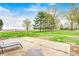 Spacious backyard featuring a concrete patio and beautiful landscaping at 5541 S County Road 150 E, Clayton, IN 46118