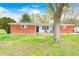 Charming brick ranch home with a cozy front porch and well-maintained lawn at 5541 S County Road 150 E, Clayton, IN 46118