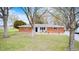 Charming brick ranch home with a cozy front porch and well-maintained lawn at 5541 S County Road 150 E, Clayton, IN 46118