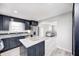 Modern kitchen featuring stainless steel appliances, granite countertops, and an island at 5541 S County Road 150 E, Clayton, IN 46118