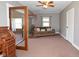 Spacious living room with ceiling fan provides relaxing retreat for Gathering or entertaining at 5693 W Walnut St, Greenwood, IN 46142