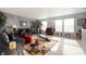 Open living room with exercise equipment, natural light, and stylish decor at 5886 N Peppereel Way, McCordsville, IN 46055