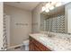 Updated bathroom with granite countertops, modern fixtures, and a clean, neutral color palette at 6075 Bristlecone Dr, Fishers, IN 46038