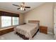Comfortable bedroom featuring a vaulted ceiling, plush carpet, and ample natural light at 6075 Bristlecone Dr, Fishers, IN 46038