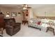 Inviting loft with a comfortable seating area, offering a relaxed and versatile space at 6075 Bristlecone Dr, Fishers, IN 46038