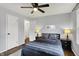 Inviting bedroom with ample natural light, hardwood floors, and tasteful decor at 6106 Evanston Ave, Indianapolis, IN 46220