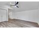 Bedroom with wood-look flooring and a closet at 614 Park Ave, Anderson, IN 46012