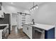 The kitchen features a new island, stainless appliances, and modern finishes at 614 Park Ave, Anderson, IN 46012