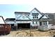 New construction home featuring a spacious design with a two-car garage in a residential neighborhood at 6217 Hampton Walk Blvd, McCordsville, IN 46055