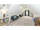 Finished bonus room with vaulted ceilings, neutral paint, and carpeted floors at 693 Prince Dr, Greenwood, IN 46142