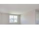 A well-lit bedroom showcasing a large window and neutral paint, offering a calm, inviting space at 7215 Barrett Dr, Brownsburg, IN 46112