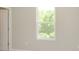 Bright bedroom with a large window and neutral paint at 7215 Barrett Dr, Brownsburg, IN 46112
