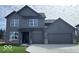New construction, two-story home with a two car garage and gray siding and trim at 7215 Barrett Dr, Brownsburg, IN 46112
