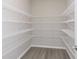 Walk-in pantry with ample shelving and storage space at 7215 Barrett Dr, Brownsburg, IN 46112