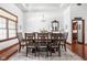 Elegant dining room with a large table, stylish decor, and ample seating for entertaining at 7340 Stones River Dr, Indianapolis, IN 46259