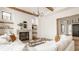 Bright living room featuring a modern fireplace, and large windows for natural light and an open floorplan at 8082 Abington Way, Zionsville, IN 46077