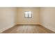 Room with wood floors, white trim and neutral paint at 8092 Abington Way, Zionsville, IN 46077