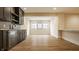 Finished basement with wood floors, wet bar with beverage cooler, and an entertainment area at 8092 Abington Way, Zionsville, IN 46077