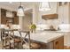 Bright kitchen with a spacious island, stainless steel appliances, and sleek white cabinetry at 8092 Abington Way, Zionsville, IN 46077