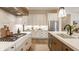 Well-appointed kitchen featuring a gas cooktop, stainless steel appliances and ample storage at 8092 Abington Way, Zionsville, IN 46077