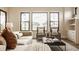 Relaxing living room with modern decor, neutral colors, and abundant natural light at 8092 Abington Way, Zionsville, IN 46077