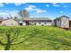 Expansive backyard with a patio, shed, and ample space for recreation and relaxation at 8110 Madrone Ct, Indianapolis, IN 46236