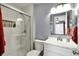 Modern bathroom with a glass-enclosed shower and sleek vanity at 8110 Madrone Ct, Indianapolis, IN 46236