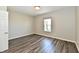 Bedroom features hard wood floors, a window and neutral colored walls at 8163 Dewberry Ln, Pendleton, IN 46064