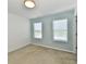 This bedroom offers plenty of light, paint accent and carpeting at 8163 Dewberry Ln, Pendleton, IN 46064