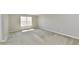 Bedroom featuring a window, carpet, and neutral-colored walls at 8163 Dewberry Ln, Pendleton, IN 46064