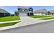 Charming two-story home with a well-manicured lawn and long concrete driveway at 8163 Dewberry Ln, Pendleton, IN 46064