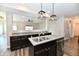 Kitchen island with granite countertops and stainless steel appliances at 8163 Dewberry Ln, Pendleton, IN 46064