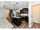 Modern kitchen with wood floors, stainless steel appliances, and a pantry at 8163 Dewberry Ln, Pendleton, IN 46064