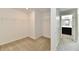Walk-in closet featuring neutral carpeting, white walls, and wire shelving at 8163 Dewberry Ln, Pendleton, IN 46064