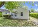Charming single-story home featuring light siding, a welcoming front door, and a well-maintained front yard at 819 E Mills Ave, Indianapolis, IN 46227