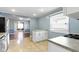 Open-concept kitchen provides lots of natural light and access to dining area at 819 E Mills Ave, Indianapolis, IN 46227